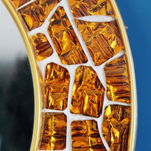 Espejo con marco de mosaico. Piezas de cristal espejado en color ambar. Vintage 60s.
